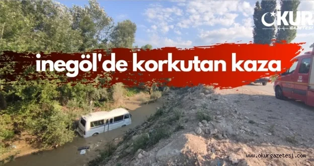 Dereye devrilen servis minibüsünün sürücüsü yaralandı