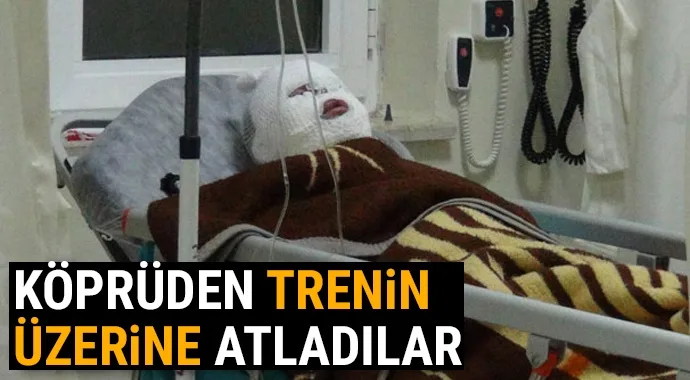KÖPRÜDEN TREN VAGONLARINA ATLAMAK İSTEDİLER AMA...